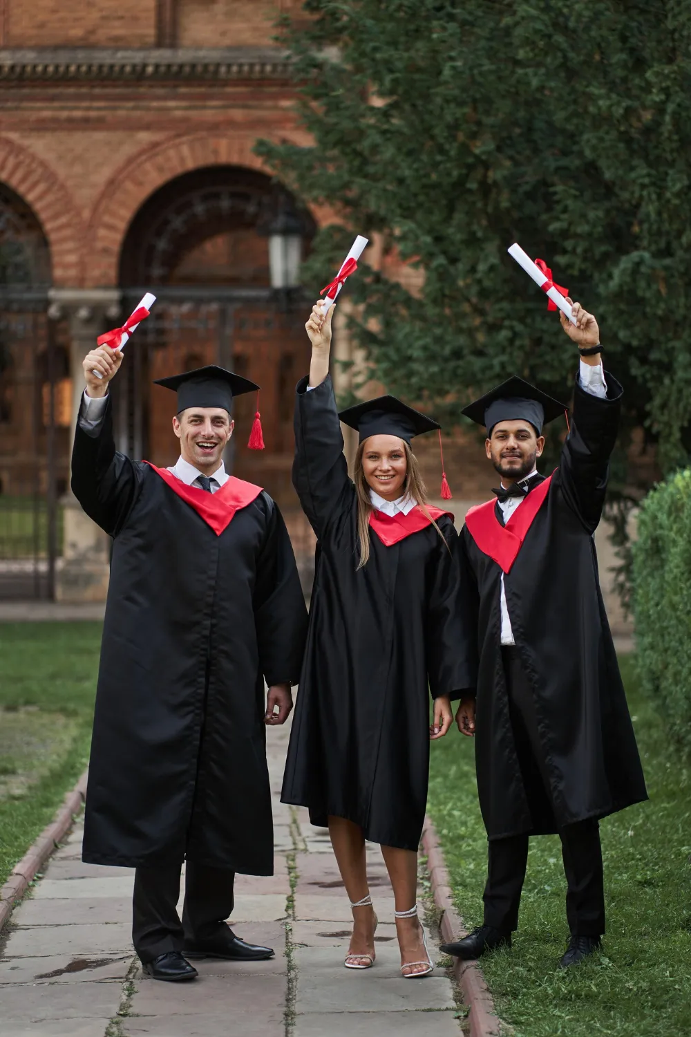 International Graduates From Celebrating Diplomas Graduation Robes